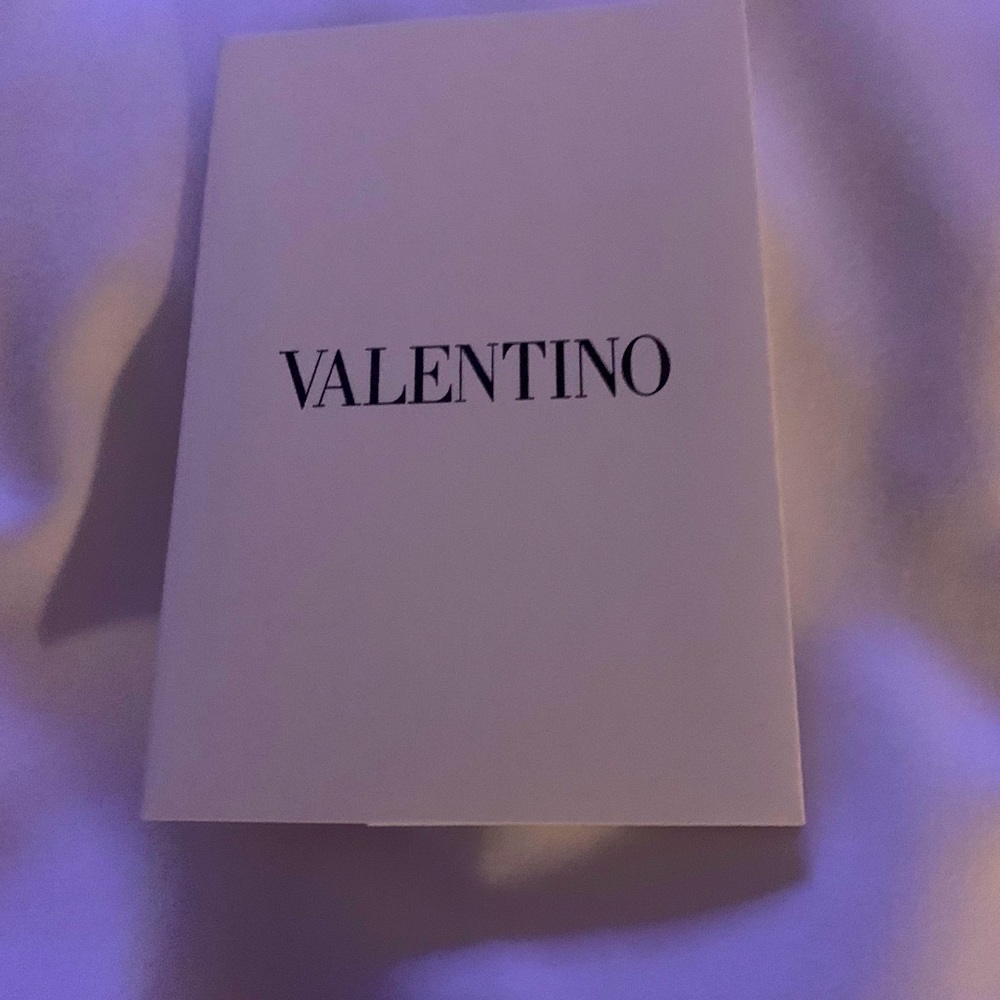 Brand new authentic Valentino receipt sleeve pocke